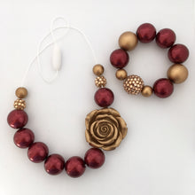 Girls red and gold Christmas bead necklace and bracelet set